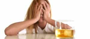 woman struggles with alcohol addiction