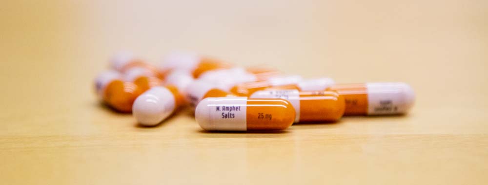 Adderall vs. Vyvanse: What’s the Difference? pills of adderall and vyvanse