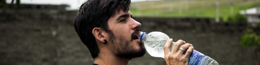 man drinking water