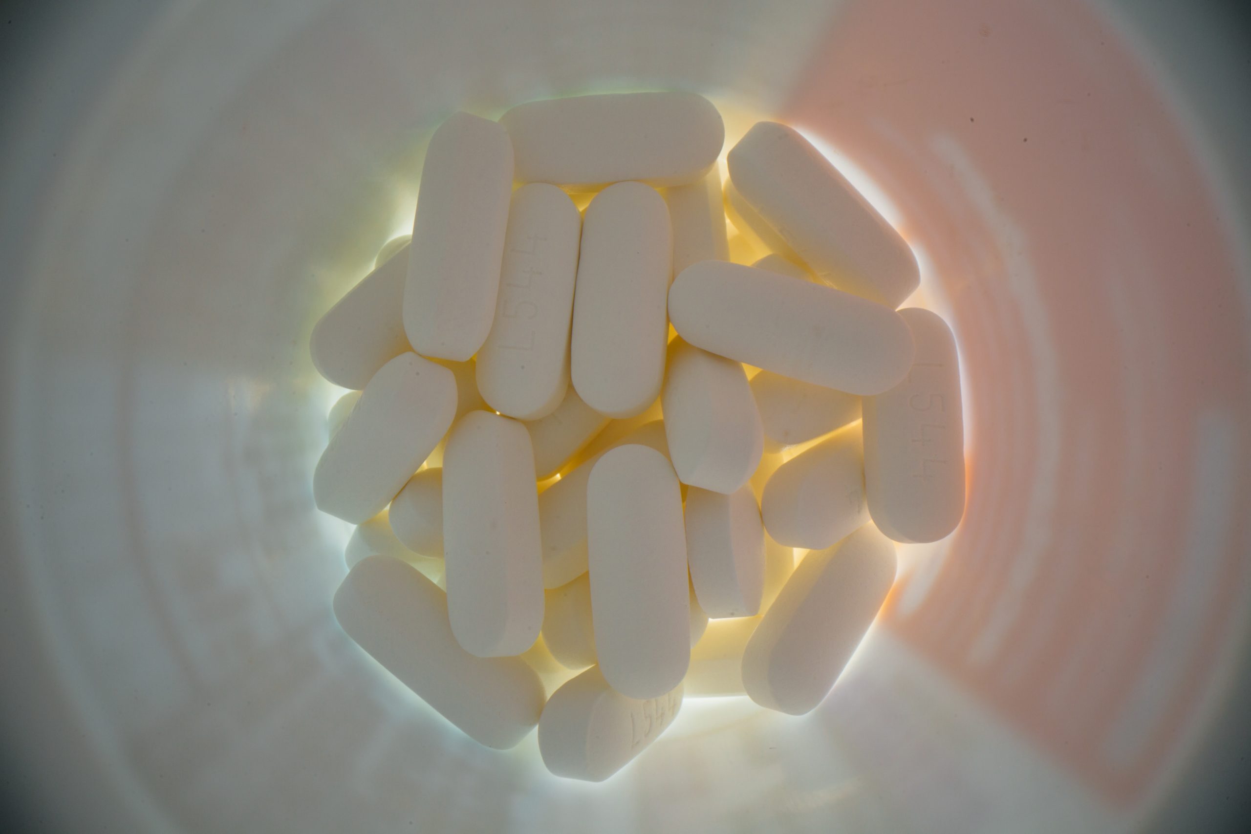Looking down into a bottle of pills