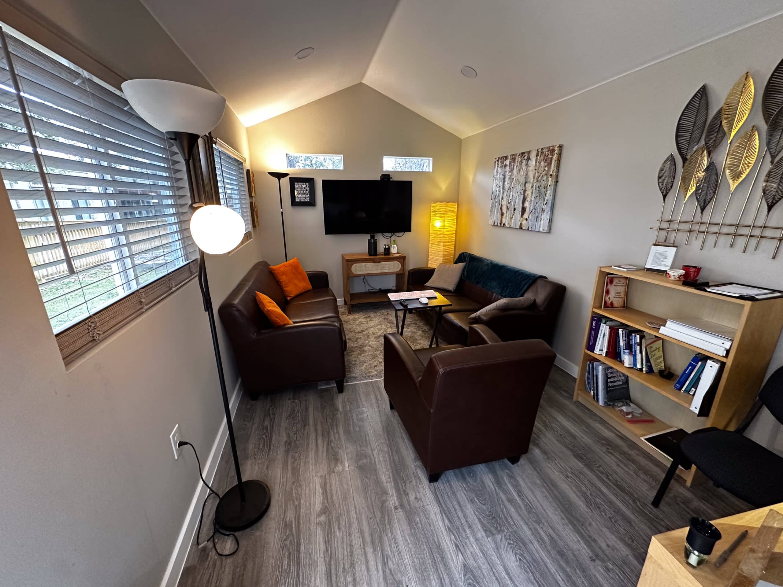 Private counseling room at Briarwood Detox Center in Austin, Texas with leather seating and therapeutic setup.