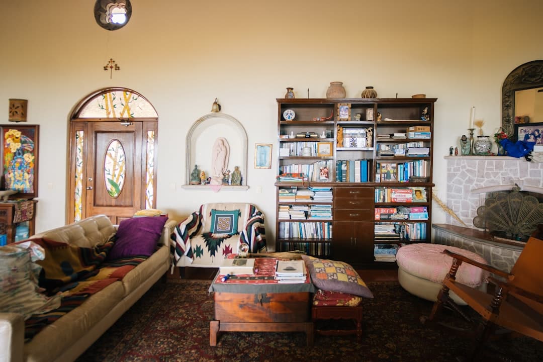 Cozy living room with eclectic decor and bookshelves -- Photo by Leonardo Vargas on Unsplash