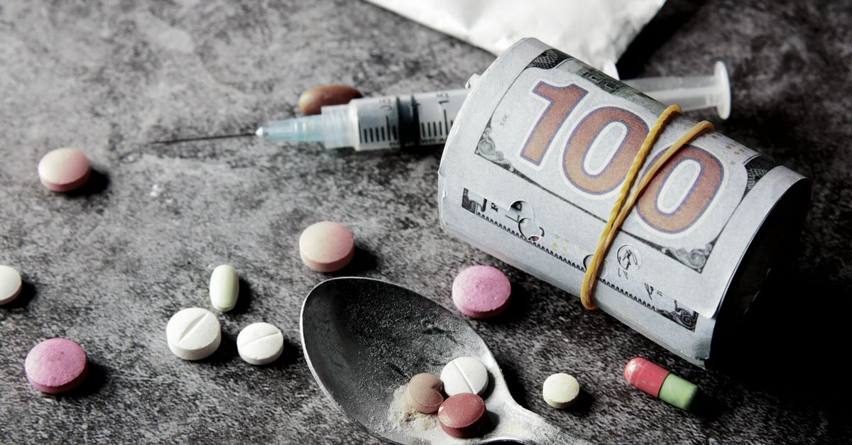 Symbolic representation of drug addiction and financial cost with pills and money.